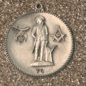 Masonic / Shriners Pendant, a Masonic Brass Coin, and a religious coin.
